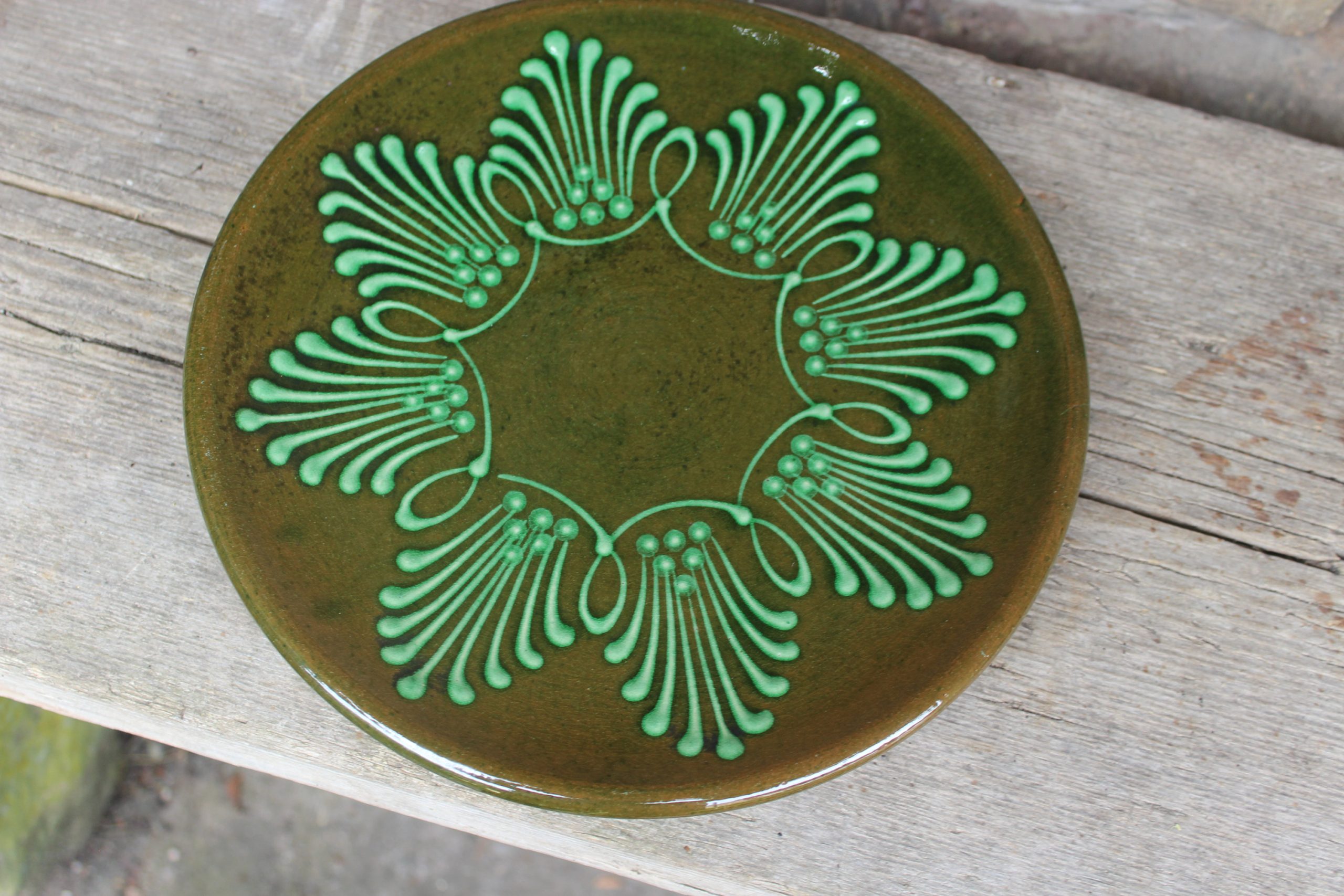Vintage embossed olive green ceramic plate